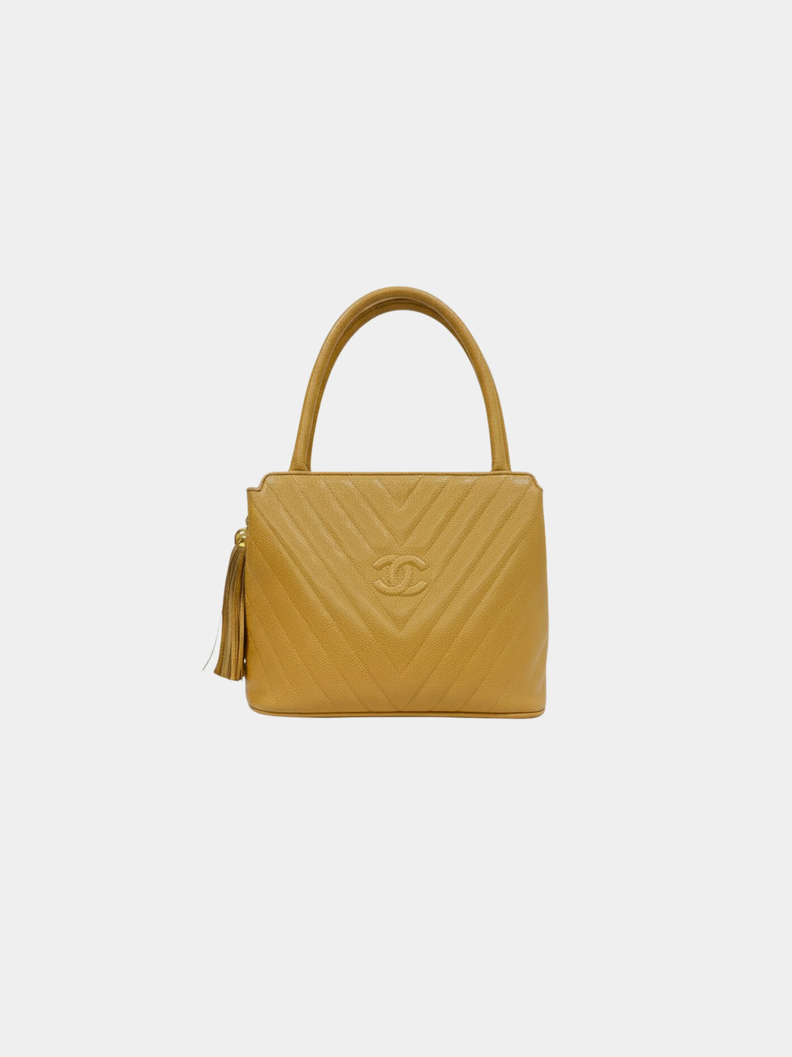 Chanel Early 1990s Beige Caviar Leather Chevron Stitch Tassel Handbag
